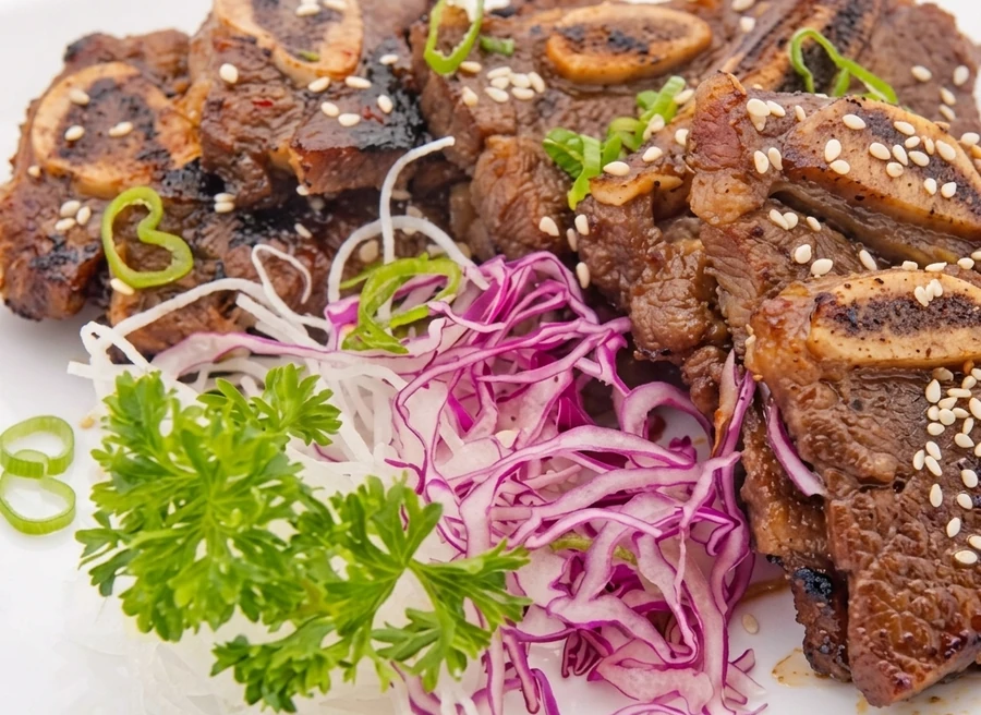 Korean-style BBQ dishes at A+ Buffet Sushi & Bar Calgary - Korean BBQ-inspired meats on the Asian buffet