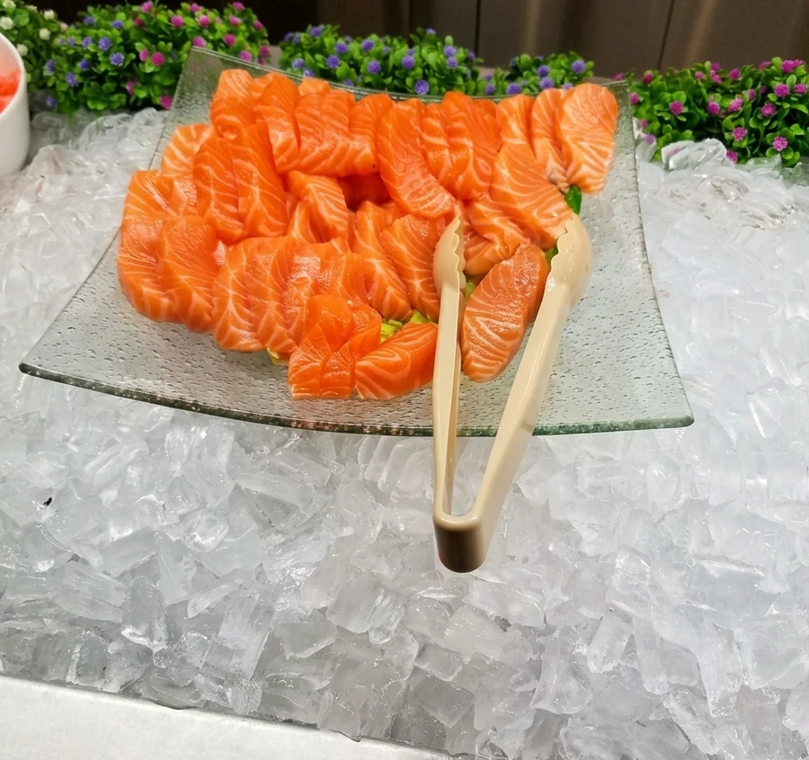 Fresh salmon and tuna sashimi at the dinner buffet, A+ Buffet Sushi & Bar Calgary